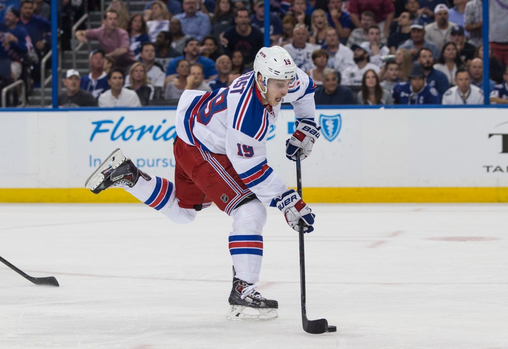 New York Rangers player Jesper Fast skating with the puck.