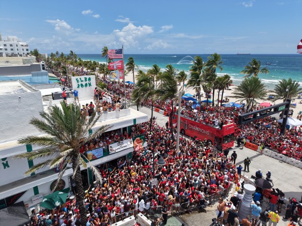 Fans celebrate during the Panthers championship parade on Fort Lauderdale...