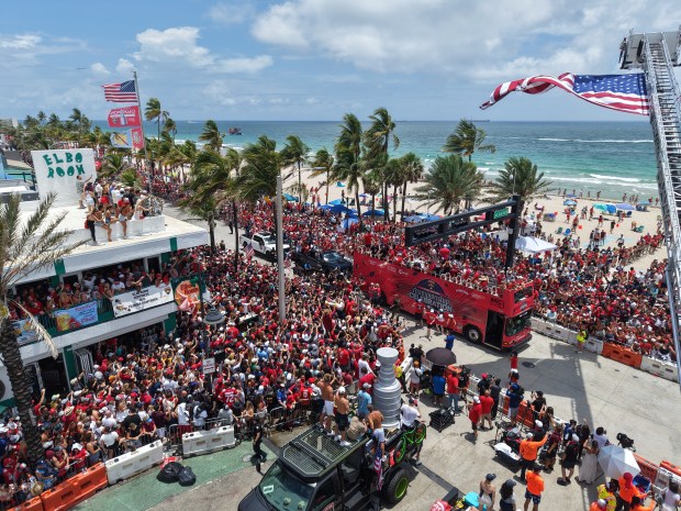 Fans celebrate during the Panthers championship parade on Fort Lauderdale...