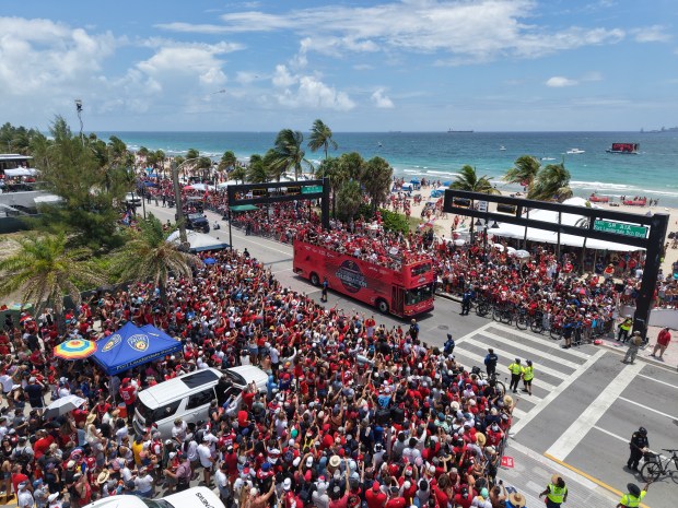 Fans celebrate during the Panthers championship parade on Fort Lauderdale...