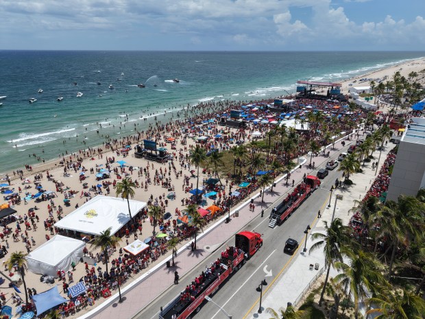 Fans celebrate during the Panthers championship parade on Fort Lauderdale...