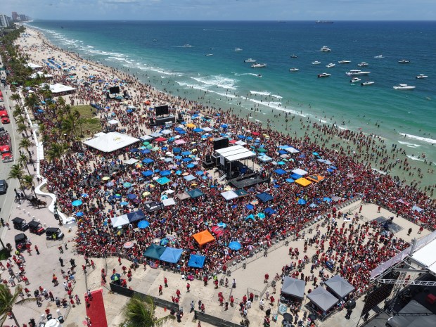 Fans celebrate during the Panthers championship parade on Fort Lauderdale...