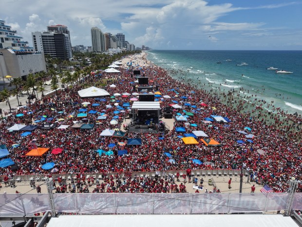 Fans celebrate during the Panthers championship parade on Fort Lauderdale...
