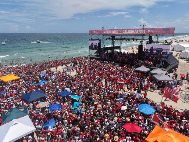 Fans celebrate during the Panthers championship parade on Fort Lauderdale...