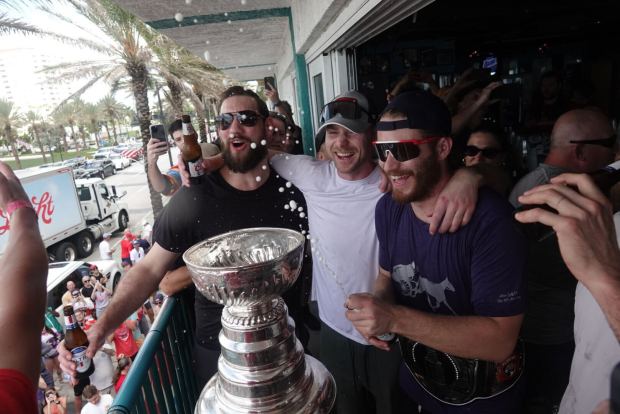 Florida Panthers Anthony Stolarz, Sam Bennett and Matthew Tkachuk sing "We Are The Champions" as they celebrate winning the the Stanley Cup at Elbo Room in Fort Lauderdale on Tuesday, June 25, 2024. (Joe Cavaretta/South Florida Sun Sentinel)