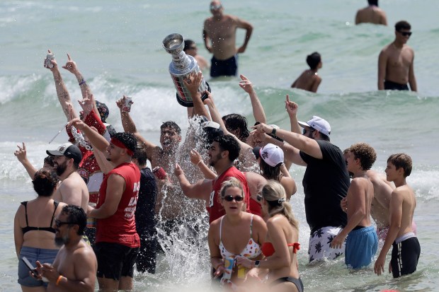 Fans celebrate at Fort Lauderdale beach as the Florida Panthers’...