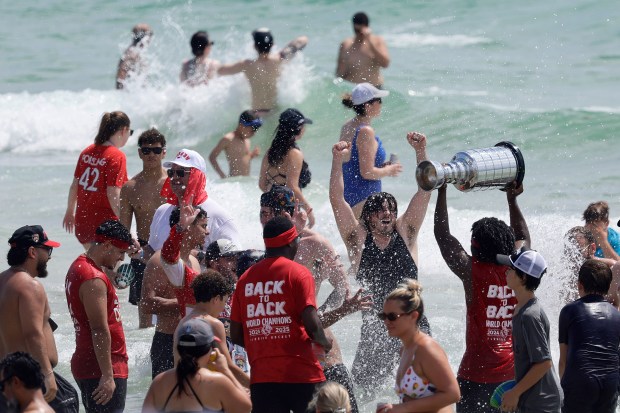 Fans celebrate at Fort Lauderdale beach as the Florida Panthers’...