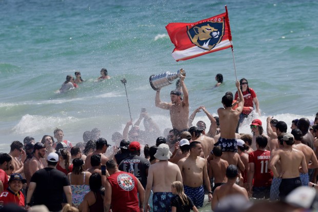 Fans celebrate at Fort Lauderdale beach as the Florida Panthers’...