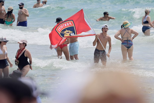 Fans celebrate at Fort Lauderdale beach as the Florida Panthers’...