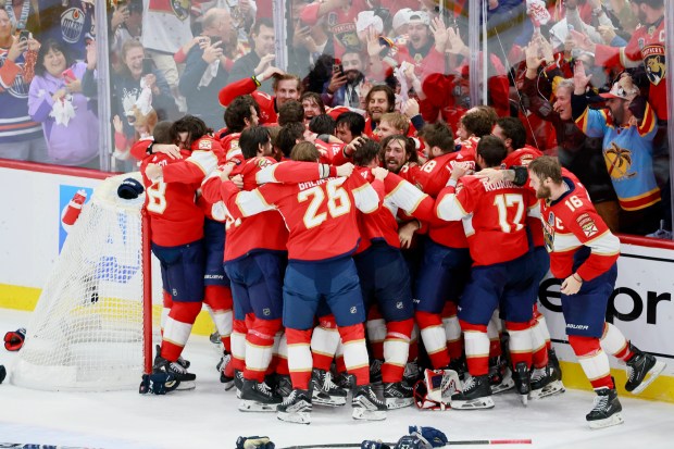 The team celebrates as Florida Panthers win Game 7 of...