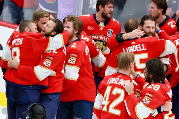 The Florida Panthers celebrate as they win Game 7 of...