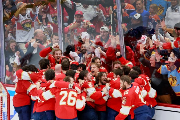 The Florida Panthers celebrate as they win Game 7 of...