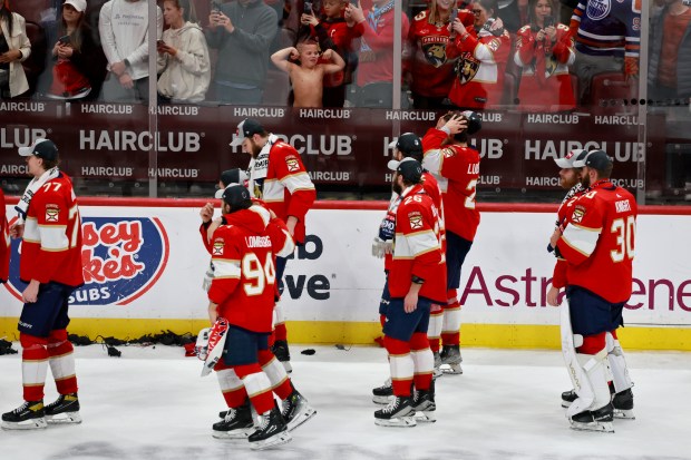 The Florida Panthers celebrate as they win Game 7 of...