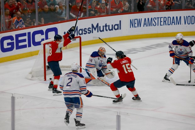 Florida Panthers center Carter Verhaeghe (23) and center Anton Lundell...
