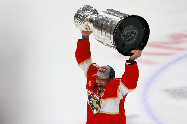 Florida Panthers right wing Kyle Okposo (8) hoists the Stanley...