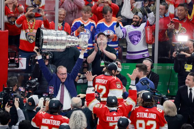 Florida Panthers head coach Paul Maurice hoists the Stanley Cup Trophy after they won Game 7 of Stanley Cup Final at Amerant Bank Arena in Sunrise on Monday, June 24, 2024. (Mike Stocker/South Florida Sun Sentinel)