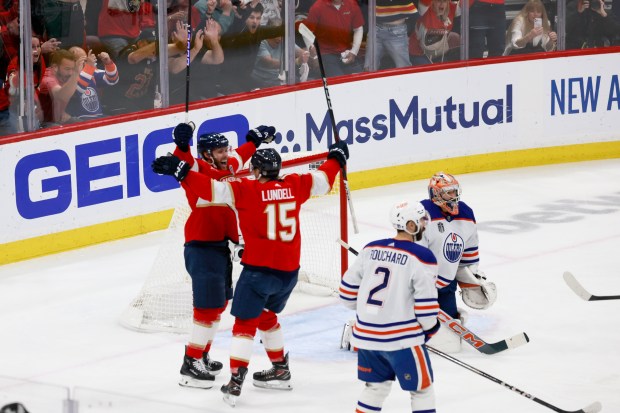 Florida Panthers center Carter Verhaeghe (23) and center Anton Lundell...
