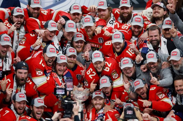 The Florida Panthers pose for photos with the Stanley Cup...