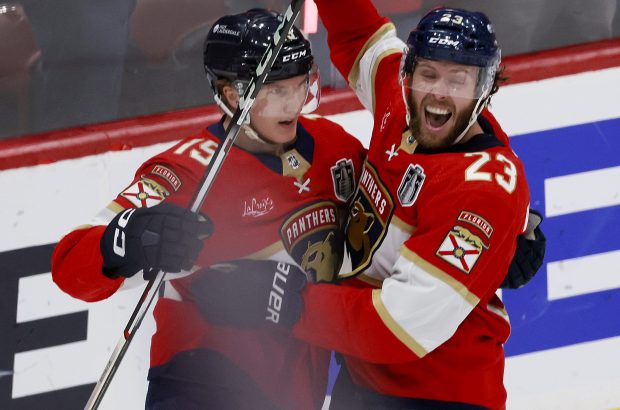 Florida Panthers center Carter Verhaeghe (23) and center Anton Lundell...