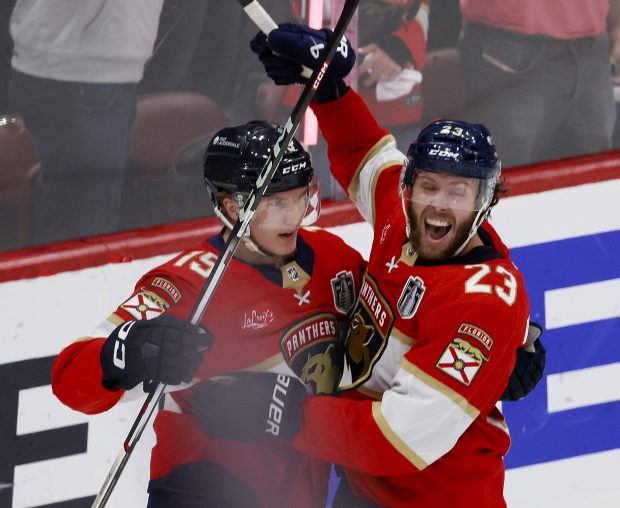 Florida Panthers center Carter Verhaeghe (23) and center Anton Lundell...