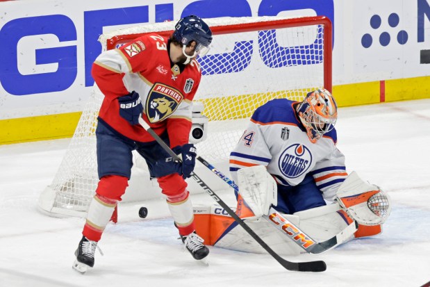 Florida Panthers center Carter Verhaeghe scores a goal against Edmonton Oilers goalie Stuart Skinner during the first period of Game 7 of the Stanley Cup Final at Amerant Bank Arena in Sunrise on Monday, June 24, 2024. (John McCall/South Florida Sun Sentinel)