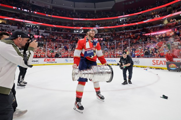 Florida Panthers left wing Matthew Tkachuk celebrates after winning the...