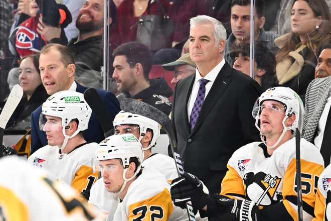 Mike Vellucci MONTREAL, CANADA - DECEMBER 12: Assistant coach Mike Vellucci of the Pittsburgh Penguins handles bench duties during the second period against the Montreal Canadiens at the Bell Centre on December 12, 2024 in Montreal, Quebec, Canada. The Pittsburgh Penguins defeated the Montreal Canadiens 9-2. (Photo by Minas Panagiotakis/Getty Images)