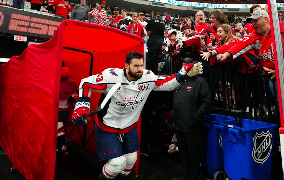 Washington Capitals right wing Tom Wilson (43) goes past the fans on his way to warm-ups.James Guillory-Imagn Images