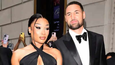 Dallas Mavericks star Klay Thompson gets cozy with Megan Thee Stallion on offseason fishing retreat
