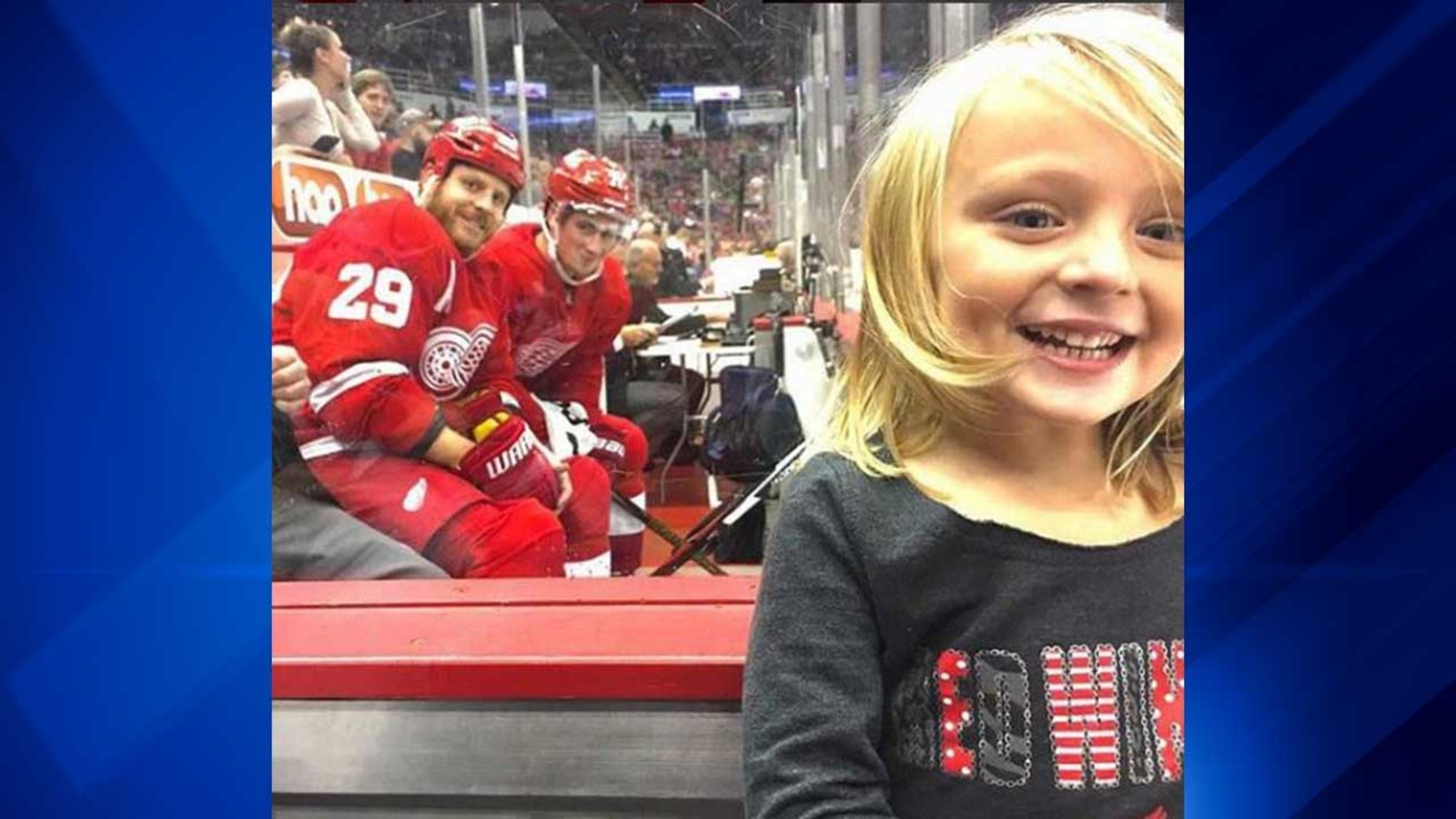 Cute hockey fan photobombed at Blackhawks-Red Wings game