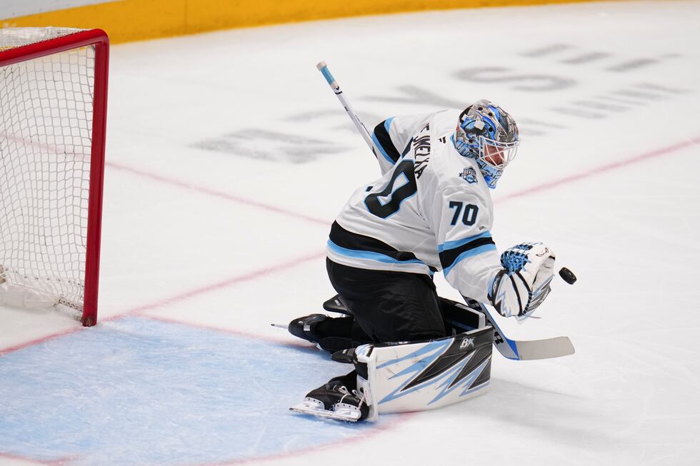 Utah Hockey Club goaltender Karel Vejmelka gloves a shot by the Dallas Stars during the third...