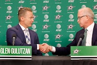 News Dallas Stars coach Glen Gulutzan shakes hands with Stars general manager Jim Nill...