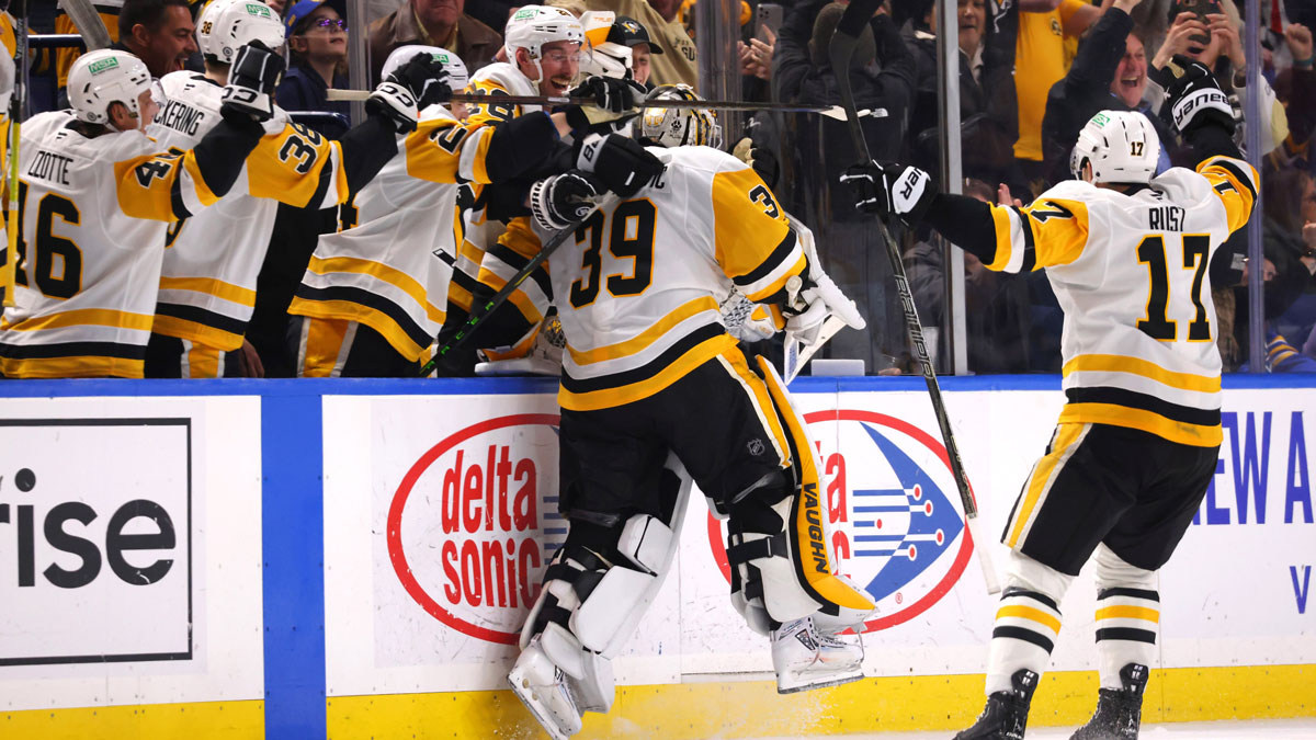 Pittsburgh Penguins goaltender Alex Nedeljkovic (39) celebrates his goal with teammates during the third period against the Buffalo Sabres at KeyBank Center.