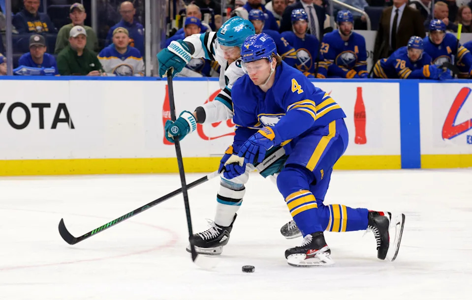 Buffalo Sabres defenseman Bowen Byram (4) defends a play during an NHL game.Timothy T&period; Ludwig-Imagn Images