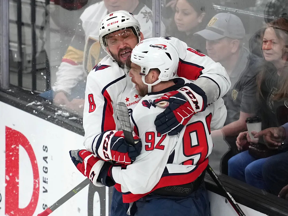 Washington Capitals left wing Alex Ovechkin (8) celebrates with center Evgeny Kuznetsov (92) after scoring a goal.Stephen R&period; Sylvanie-USA TODAY Sports via Imagn Images