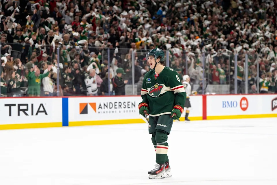 Apr 24, 2025; Saint Paul, Minnesota, USA; Minnesota Wild defenseman Zeev Buium (8) celebrates victory over the Vegas Golden Knights in his home debut in game three of the first round of the 2025 Stanley Cup Playoffs at Xcel Energy Center.Credit&colon; Matt Blewett-Imagn Images