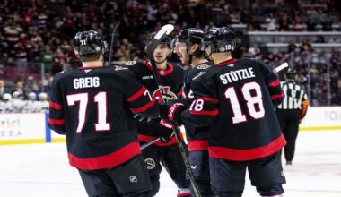 Ottawa Senators defenceman Jake Sanderson, centre-right, celebrates his goal with teammates during second period NHL hockey action against the Tampa Bay Lightning in Ottawa, on Thursday, April 3, 2025. (Spencer Colby/The Canadian Press via AP)