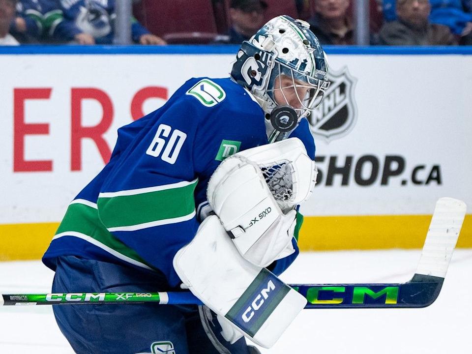  Nikita Tolopilo makes an overtime save against the San Jose Sharks during his NHL debut on April 14 at Rogers Arena.