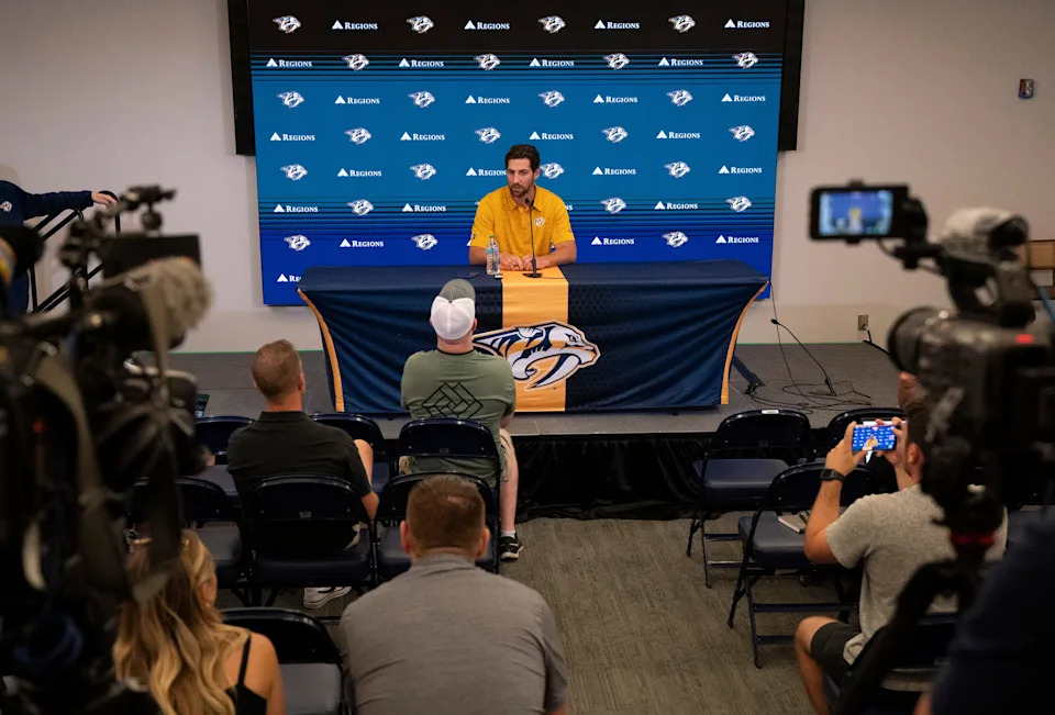 Nashville Predators defenseman Nicolas Hague speaks to the media after being introduced as a recent acquisition of the team at Bridgestone Arena in Nashville, Tenn., Thursday, July 10, 2025.