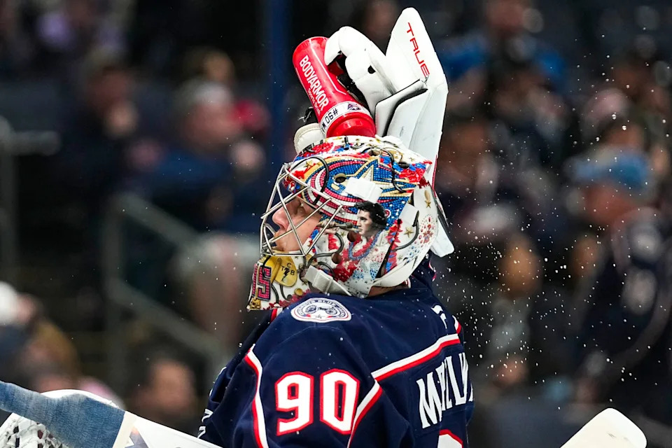 Columbus Blue Jackets goaltender Elvis Merzlikins (90) sprays water on his helmet in the second period at Nationwide Arena on Thursday, April 3, 2025 in Columbus, Ohio.