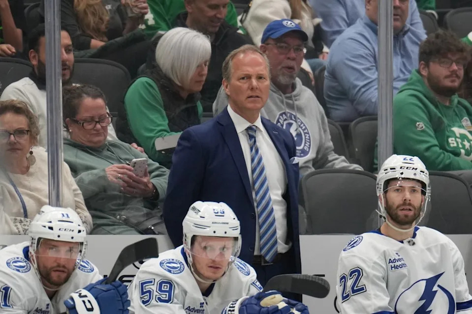 Jon Cooper watches the action from behind the bench against the Dallas Stars at the American Airlines Center on March 20, 2025. NHLI via Getty Images