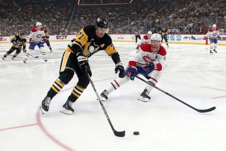 Nov 2, 2024; Pittsburgh, Pennsylvania, USA; Pittsburgh Penguins center Evgeni Malkin (71) moves the puck against the Montreal Canadiens defenseman Mike Matheson (8) during the first period at PPG Paints Arena. Mandatory Credit: Charles LeClaire-Imagn Images Nov 2, 2024; Pittsburgh, Pennsylvania, USA; Pittsburgh Penguins center Evgeni Malkin (71) moves the puck against the Montreal Canadiens defenseman Mike Matheson (8) during the first period at PPG Paints Arena. Mandatory Credit: Charles LeClaire-Imagn Images