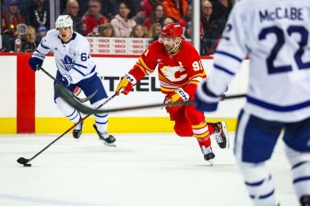 Calgary Flames forward Nazem Kadri skating through the neutral zone against the Toronto Maple Leafs. Calgary Flames forward Nazem Kadri skating through the neutral zone against the Toronto Maple Leafs.