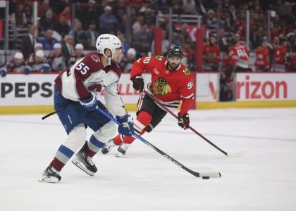 Apr 2, 2025; Chicago, Illinois, USA; Colorado Avalanche defenseman Ryan Lindgren (55) and Chicago Blackhawks center Joe Veleno (90) battle for control of the puck during the first period at United Center. Mandatory Credit: Talia Sprague-Imagn Images Apr 2, 2025; Chicago, Illinois, USA; Colorado Avalanche defenseman Ryan Lindgren (55) and Chicago Blackhawks center Joe Veleno (90) battle for control of the puck during the first period at United Center. Mandatory Credit: Talia Sprague-Imagn Images