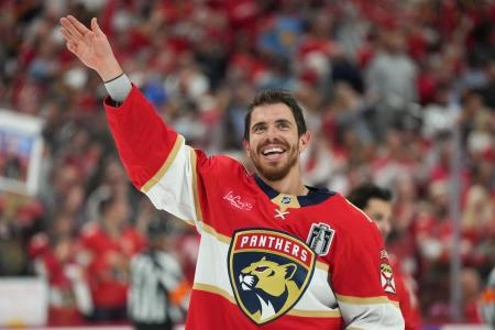 Jun 17, 2025; Sunrise, Florida, USA; Florida Panthers center Evan Rodrigues (17) waves after winning game six of the 2025 Stanley Cup Final against the Edmonton Oilers at Amerant Bank Arena. Mandatory Credit: Jim Rassol-Imagn Images Jun 17, 2025; Sunrise, Florida, USA; Florida Panthers center Evan Rodrigues (17) waves after winning game six of the 2025 Stanley Cup Final against the Edmonton Oilers at Amerant Bank Arena. Mandatory Credit: Jim Rassol-Imagn Images