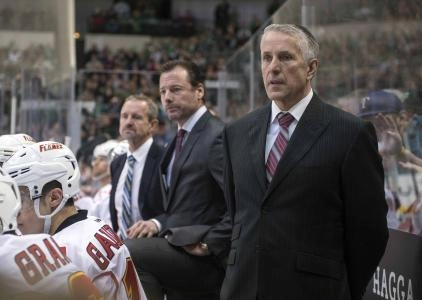 Jan 25, 2016; Dallas, TX, USA; Calgary Flames head coach Bob Hartley watches his team take on the Dallas Stars during the third period at the American Airlines Center. The Stars defeat the Flames 2-1. Mandatory Credit: Jerome Miron-Imagn Images