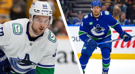 Vancouver Canucks forwards Teddy Blueger and Dakota Joshua