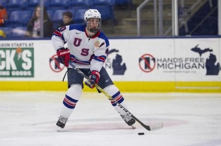 USA forward Aidan Hreschuk skates with the puck USA forward Aidan Hreschuk skates with the puck
