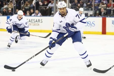 Feb 28, 2025; New York, New York, USA; Toronto Maple Leafs right wing Ryan Reaves (75) controls the puck in the second period against the New York Rangers at Madison Square Garden. Mandatory Credit: Wendell Cruz-Imagn Images