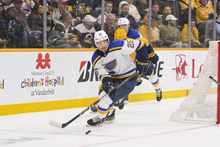 Mar 18, 2025; Nashville, Tennessee, USA; St. Louis Blues center Jordan Kyrou (25) skates behind the net against the Nashville Predators during the first period at Bridgestone Arena. Mandatory Credit: Steve Roberts-Imagn Images Mar 18, 2025; Nashville, Tennessee, USA; St. Louis Blues center Jordan Kyrou (25) skates behind the net against the Nashville Predators during the first period at Bridgestone Arena. Mandatory Credit: Steve Roberts-Imagn Images